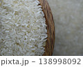 Raw rice in wooden bowl on a blur background. 138998092