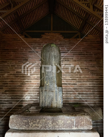 Ancient Stone Shiva Lingam in a Brick Temple Sanctuary Ancient Stone Shiva Lingam in a Brick Temple Sanctuary 138999441