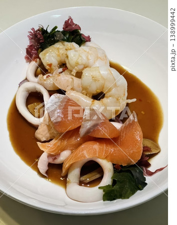 Fresh Mixed Seafood Platter with Salmon Sashimi, Shrimp and Squid in Savory Sauce Fresh Mixed Seafood Platter with Salmon Sashimi, Shrimp and Squid in Savory Sauce 138999442