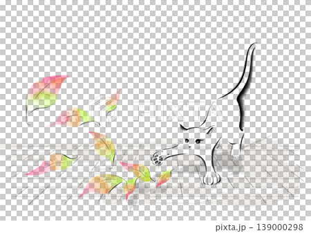 A cat playing with fallen leaves swirling in the wind on the cobblestone street. 139000298