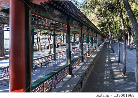 Summer Palace Long Corridor in Beijing is a covered walkway famous for its 728 meter length in conjunction with its rich painted decoration Summer Palace Long Corridor in Beijing is a covered walkway famous for its 728 meter length in conjunction with its rich painted decoration 139001969