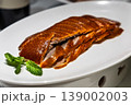 Serving of popular Peking Duck or Beijing duck, crispy skin roasted to perfection in China 139002003