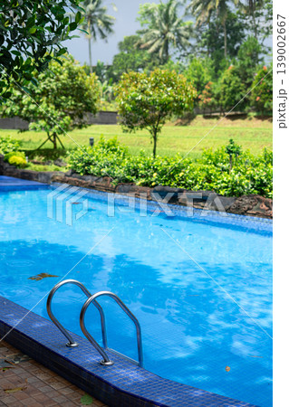 Poolside View with Rice Fields and Blue Sky 139002667