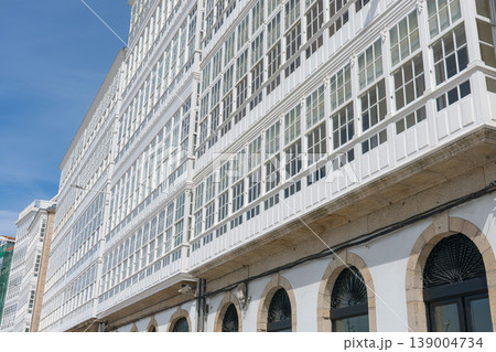 Facade of the emblematic glass galleries on Avenida de la Marina in the city of A Coruna 139004734