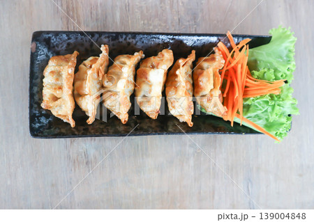 Chinese dumpling, dumpling or wonton or fried wonton or gyoza or Japanese fried dumpling 139004848