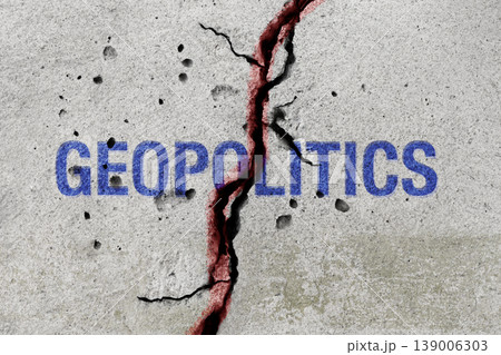 Cracked surface with geopolitics text divided by red line, Global conflict Cracked surface with geopolitics text divided by red line, Global conflict 139006303