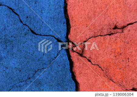 Cracked concrete surface in two colors, Conflict and divisio Cracked concrete surface in two colors, Conflict and divisio 139006304