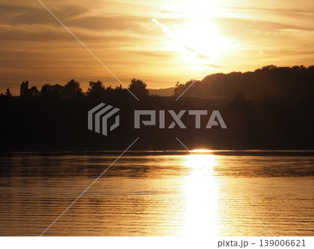 View of sun set on Rhine River near Stein am Rhein town in Switzerland View of sun set on Rhine River near Stein am Rhein town in Switzerland 139006621