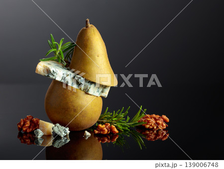 Blue cheese with pear, walnuts, and rosemary. 139006748