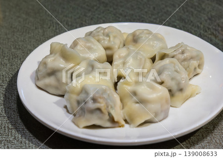 Beijing popular and delicious steam dumpling with abundant fillings in restaurant Beijing popular and delicious steam dumpling with abundant fillings in restaurant 139008633
