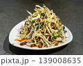 Serving of Chinese specialty cold salad with cabbage and groundnuts as appetizer. 139008635