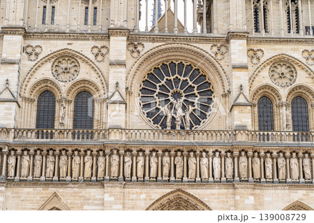 Gothic rose round window in Paris France Cathedral of Notre Dame de Paris. Old building French architecture 139008729