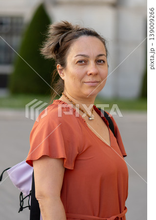 Woman 40-45 years old looking aside showing calm confidence and natural behavior Woman 40-45 years old looking aside showing calm confidence and natural behavior 139009266