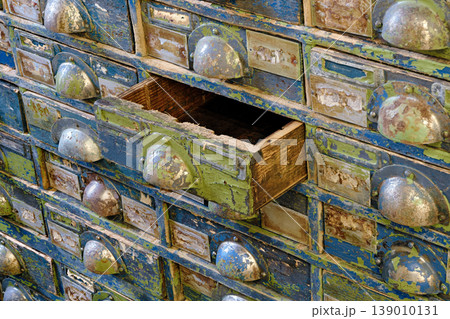 Very old wooden cabinet with multiple drawers - cards, files, tools or fasteners storage unit Very old wooden cabinet with multiple drawers - cards, files, tools or fasteners storage unit 139010131