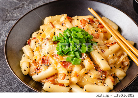 Spicy Rice Cake with Cheese and Bacon or Cream Teokbokki, Tteokbokki. 139010802