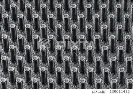 Close-Up of Metal Bolts in a Pattern Close-Up of Metal Bolts in a Pattern 139011456