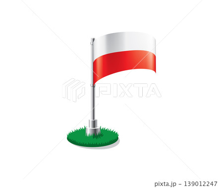 Polish flag on a flagpole mounted on the grass 139012247