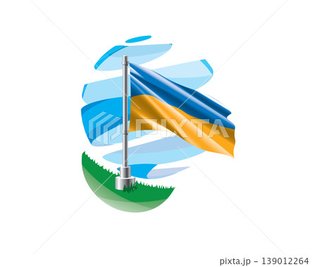 Ukrainian flag on a green lawn against a background of blue abstract sky 139012264