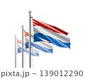 Brightly shining Netherlandish flags wave proudly on tall masts during official celebration events 139012290