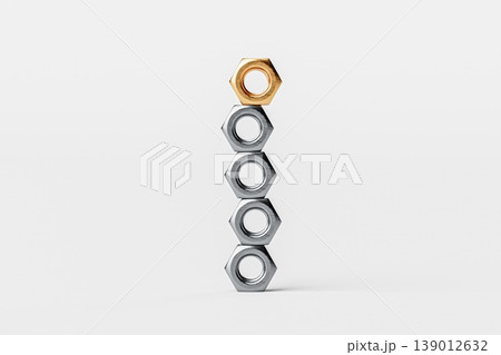 Stack of Metallic Nuts with One Gold Nut Stack of Metallic Nuts with One Gold Nut 139012632