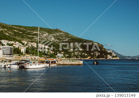 Amazing view of Dubrovnik and the sea in a sunny day. Travel destination in Croatia. Amazing view of Dubrovnik and the sea in a sunny day. Travel destination in Croatia. 139013149