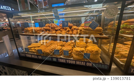 Bread and Greek pastries lined up in a showcase 139013781