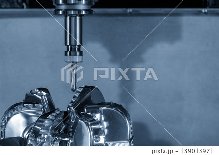 Precision CNC milling process finishing a high-quality drill bit part using a ball nose end mill tool. Precision CNC milling process finishing a high-quality drill bit part using a ball nose end mill tool. 139013971