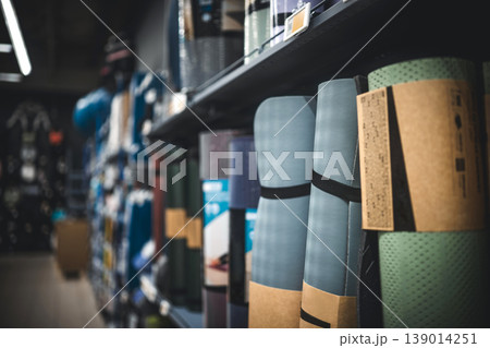 Rolled Yoga Mats on Store Shelf Rolled Yoga Mats on Store Shelf 139014251