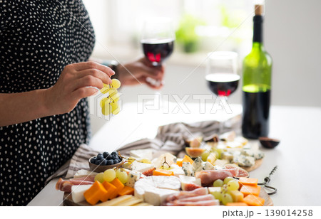 Girl Drinking Wine In With Appetizer 139014258