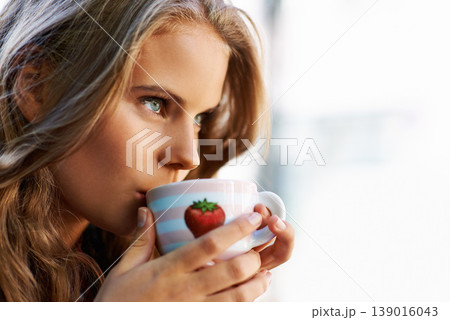 Woman, thinking and drink at coffee shop with espresso, latte or relax in city, cafe and restaurant. Calm, mindset and person with green tea, cup and brunch in morning with freedom and peace Woman, thinking and drink at coffee shop with espresso, latte or relax in city, cafe and restaurant. Calm, mindset and person with green tea, cup and brunch in morning with freedom and peace 139016043