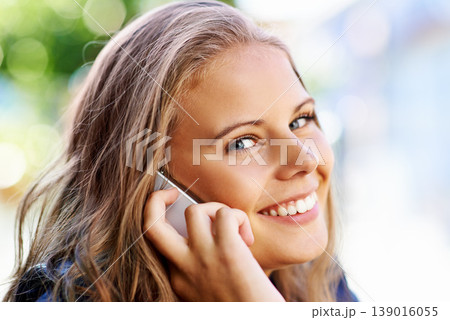 Portrait, happy woman and outdoor for phone call in closeup for communication. Person, student and excited emoji for mobile app, conversation or talk by cellular, connection or network by outside Portrait, happy woman and outdoor for phone call in closeup for communication. Person, student and excited emoji for mobile app, conversation or talk by cellular, connection or network by outside 139016055