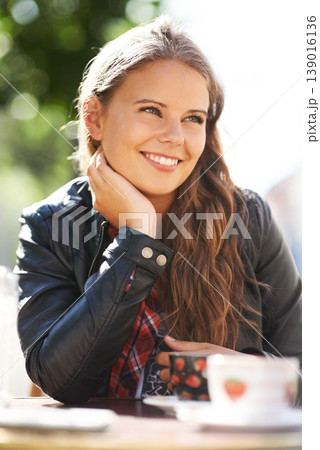 Teenager, smile and relax at outdoor coffee shop, cafe or restaurant with espresso, latte or beverage. Happy, girl and sitting with green tea, drink or calm brunch in summer, morning or city bistro Teenager, smile and relax at outdoor coffee shop, cafe or restaurant with espresso, latte or beverage. Happy, girl and sitting with green tea, drink or calm brunch in summer, morning or city bistro 139016136