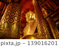 Golden the huge Buddha statue enshrined in Wat Phanan Choeng, called Wat Luang Pho Tho in Ayutthaya, Thailand. 139016201