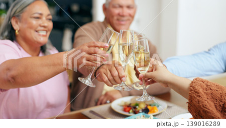 Family, hands and champagne toast for holiday celebration, thanksgiving and thank you or congratulations. Happy senior people with wine glasses, drinks or alcohol for party, lunch and success at home 139016289