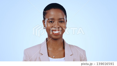 Portrait, black woman and smile in studio for business, pride and confident lawyer isolated on blue background in Nigeria. Happy legal attorney, employee and expert working for professional career Portrait, black woman and smile in studio for business, pride and confident lawyer isolated on blue background in Nigeria. Happy legal attorney, employee and expert working for professional career 139016591
