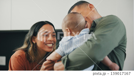 Family, smile and play or care, love and bonding in kitchen, relax and support or laughing at home. Happy parents and baby, connect and hug or embrace, fun and humor or conversation, silly and talk Family, smile and play or care, love and bonding in kitchen, relax and support or laughing at home. Happy parents and baby, connect and hug or embrace, fun and humor or conversation, silly and talk 139017167