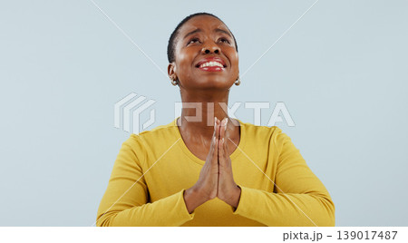 Woman, praying hands and religion for hope, faith and asking god for help with spiritual support or opportunity in studio. Christian, African person and prayer emoji for forgive on a white background Woman, praying hands and religion for hope, faith and asking god for help with spiritual support or opportunity in studio. Christian, African person and prayer emoji for forgive on a white background 139017487