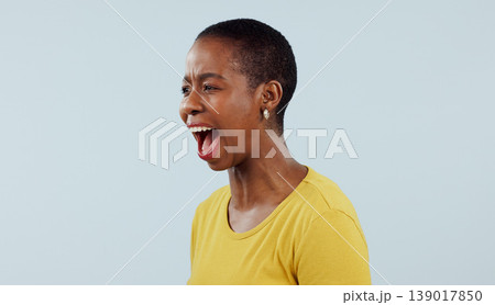 Anxiety, stress and angry black woman screaming in studio with broken heart, grief or fear on grey background. Psychology, depression and African female model shouting with trauma, conflict or crisis Anxiety, stress and angry black woman screaming in studio with broken heart, grief or fear on grey background. Psychology, depression and African female model shouting with trauma, conflict or crisis 139017850