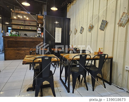 this is interior of a cafe, as one famous cafe in Jakarta city this is interior of a cafe, as one famous cafe in Jakarta city 139018673