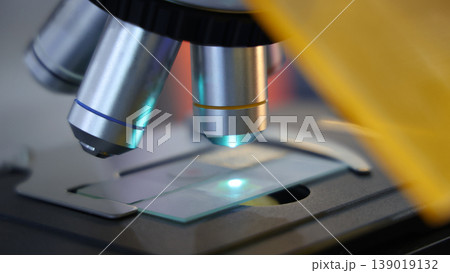 Microscope. Advanced microscopes and digital imaging systems analyzing samples in a modern laboratory. Ideal for medical research microbiology diagnostics biotechnology and science innovation concept 139019132