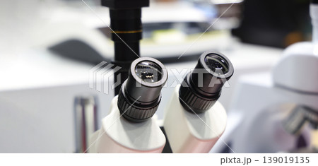 Microscope. Advanced microscopes and digital imaging systems analyzing samples in a modern laboratory. Ideal for medical research microbiology diagnostics biotechnology and science innovation concept 139019135