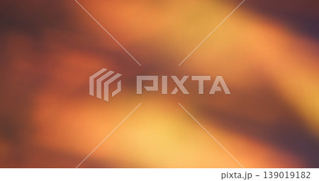 Leak lens defocused. Optical flare. Orange brown red light on dark background. Hot color prism burn rays luminosity abstract texture. Leak lens defocused. Optical flare. Orange brown red light on dark background. Hot color prism burn rays luminosity abstract texture. 139019182