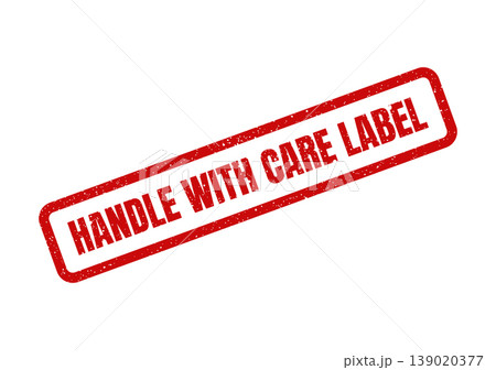 Red textured rectangular rubber stamp with HANDLE WITH CARE LABEL indicating a specific handling instruction 139020377