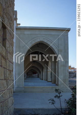 Elegant arches in a historic architectural setting during the golden hour at the ancient site. Elegant arches in a historic architectural setting during the golden hour at the ancient site. 139021291
