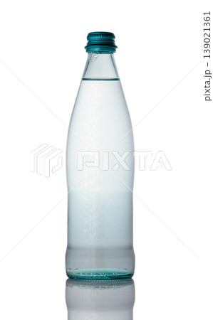 Glass Mineral Water Bottle Without Label Isolated on White Background Glass Mineral Water Bottle Without Label Isolated on White Background 139021361