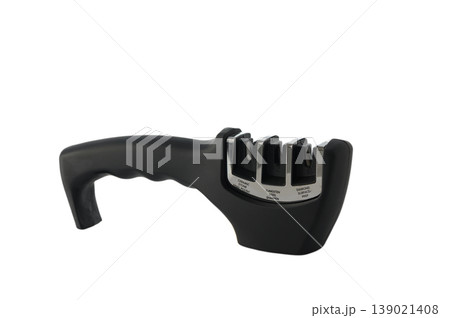 Manual knife sharpener, kitchen tool isolated on white background. Manual knife sharpener, kitchen tool isolated on white background. 139021408
