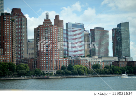 Metropolitan Skyline Highlights Busy Port Activity With Sailboats And Modern Structures. New York Metropolitan Skyline Highlights Busy Port Activity With Sailboats And Modern Structures. New York 139021634