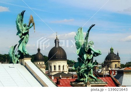 Panoramic shot of historical part of town with patina sculptures and churches Panoramic shot of historical part of town with patina sculptures and churches 139021643
