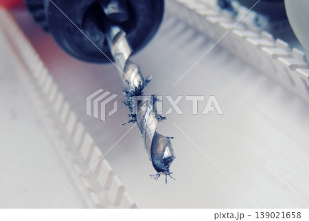 Magnetic effect of metal shavings after drilling close up Magnetic effect of metal shavings after drilling close up 139021658