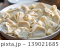 A plate of Georgian khinkali dumplings, Georgian dumplings served on a white plate 139021685